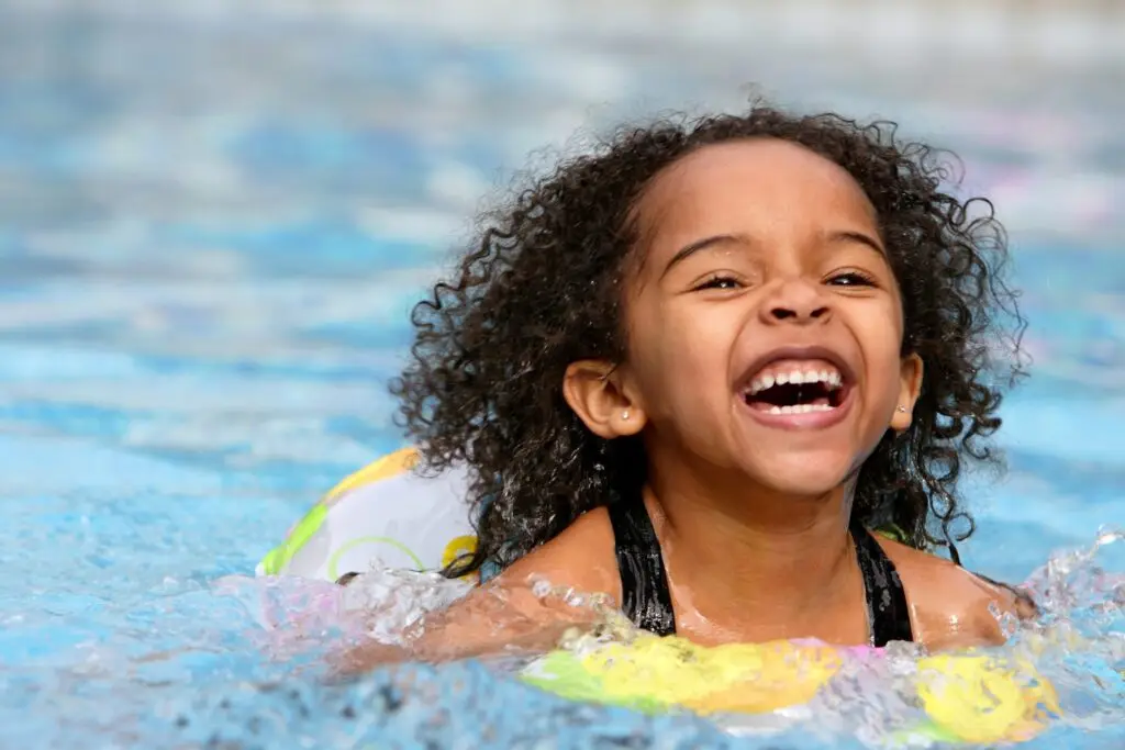 girl swimming in pool